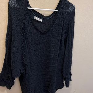 Ripped black knitted sweater